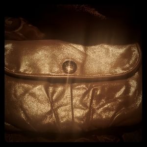 Large Coach shimmering gold clutch wrislet